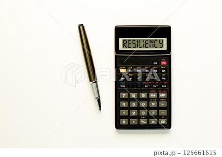 Resiliency symbol. Concept word Resiliency on beautiful black calculator. Beautiful white paper background. Beautiful black pen. Business resiliency concept. Copy space. 125661615
