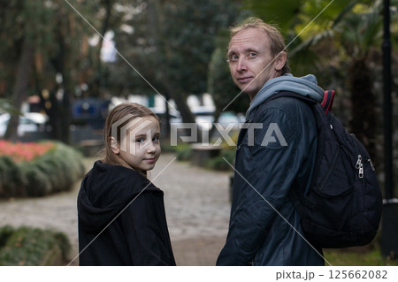 Happy family together. Young girl daughter and her father portrait 125662082