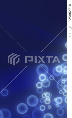 Abstract composition of glowing blue particles resembling floating bubbles on a dark background, evoking a sense of fluidity and motion 125662710