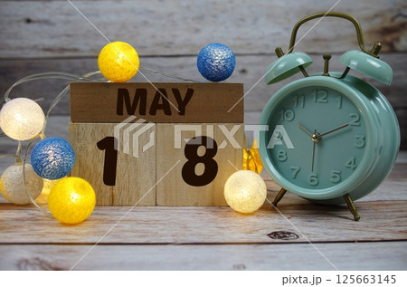 Wooden Calendar Showing the Date of May 18th. Day 18 of May month Wooden Calendar Showing the Date of May 18th. Day 18 of May month 125663145