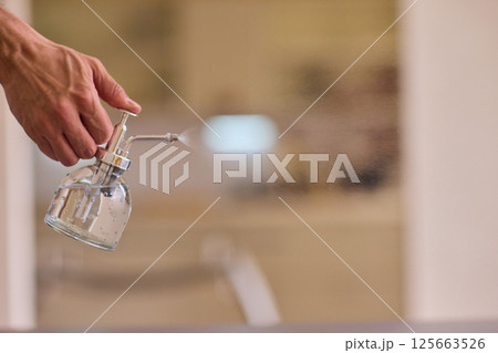 This is a Handheld Sprayer designed specifically for the effective Indoor Plant Care and Maintenance This is a Handheld Sprayer designed specifically for the effective Indoor Plant Care and Maintenance 125663526