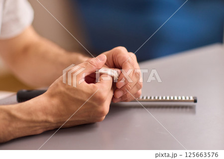 Healthcare Preparations Hand Holding Essential Medical Supplies for Effective Care 125663576