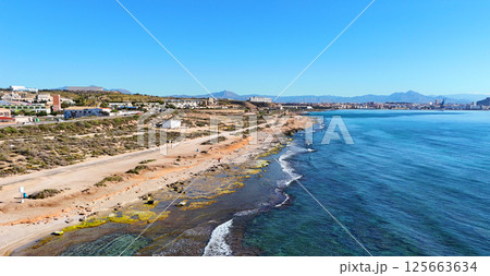Aerial view long stretch of Spanish coastline 125663634