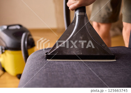 The Professional Upholstery Cleaning Process is in full action, showcasing its effectiveness 125663745