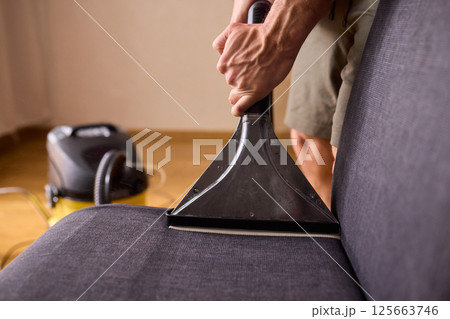 The Professional Upholstery Cleaning Process is in full action, showcasing its effectiveness 125663746