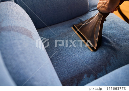The Professional Upholstery Cleaning Process is in full action, showcasing its effectiveness 125663778