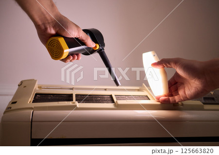 Hands are Actively Engaged in Various Tasks such as Air Conditioning Repair and Ongoing Maintenance Hands are Actively Engaged in Various Tasks such as Air Conditioning Repair and Ongoing Maintenance 125663820