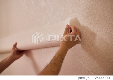 Approaching the Task of Applying Wallpaper with Care for a Beautiful and Stunning Interior 125663873