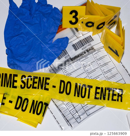 Forensic Scene Tape, Gloves, and Evidence Bag 125663909