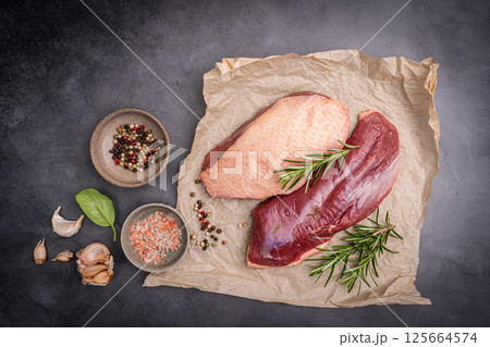 Preparation for cooking raw duck breast Preparation for cooking raw duck breast 125664574