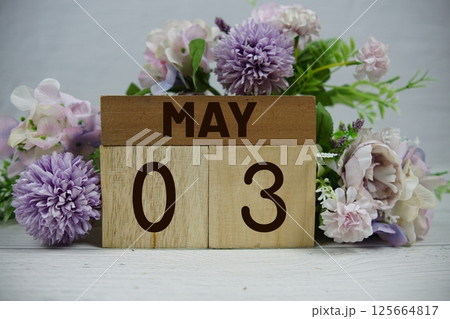 Wooden Calendar Showing the Date of May 3rd. Day 3 of May month Wooden Calendar Showing the Date of May 3rd. Day 3 of May month 125664817