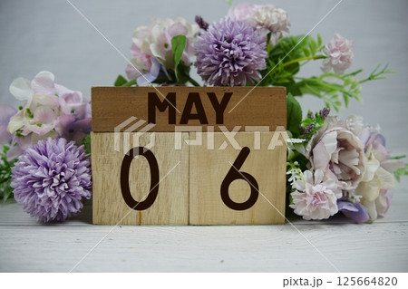 Wooden Calendar Showing the Date of May 6th. Day 6 of May month Wooden Calendar Showing the Date of May 6th. Day 6 of May month 125664820