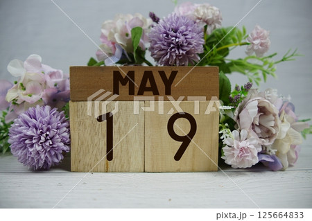 Wooden Calendar Showing the Date of May 19th. Day 19 of May month Wooden Calendar Showing the Date of May 19th. Day 19 of May month 125664833