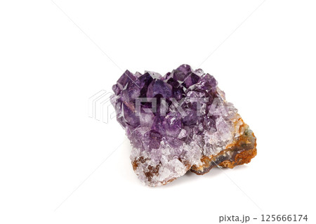 Amethyst Crystal Druse macro mineral on white background Amethyst Crystal Druse macro mineral on white background 125666174