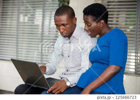 portrait of young people with laptop. 125666723