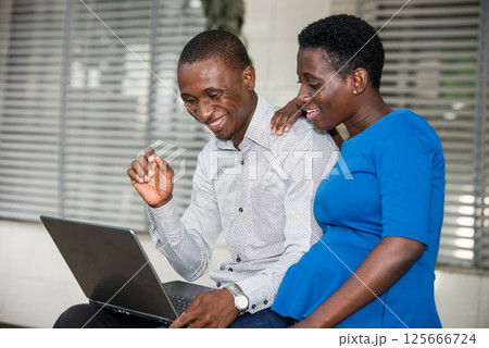 portrait of young people with laptop, happy. 125666724