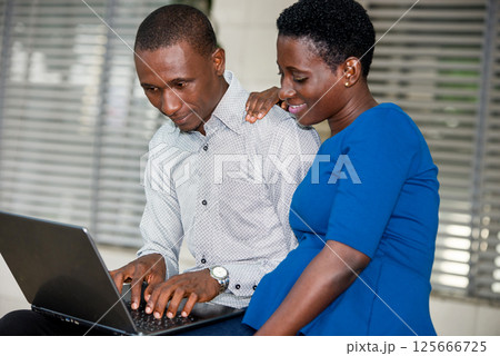 portrait of young people with laptop, happy. 125666725