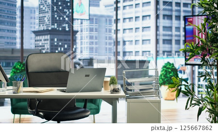 Empty high end corporation workspace with modern tools and gadgets that serve in the business industry. Corporate culture concept, career development with executive power. 125667862