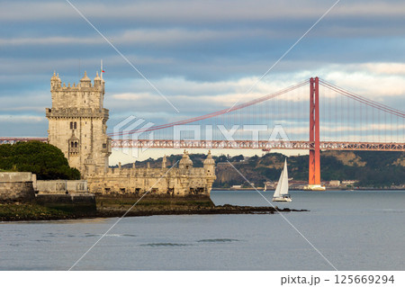 Belem Tower and 25th of April Bridge. Lisbon, Portugal Belem Tower and 25th of April Bridge. Lisbon, Portugal 125669294