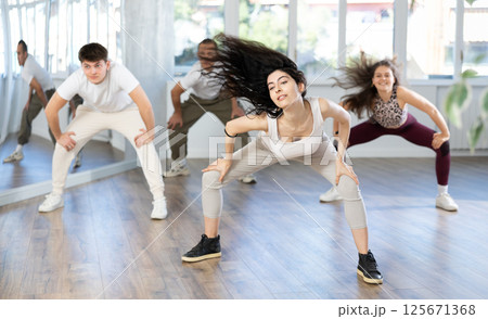 Group of young people dancing hip hop 125671368