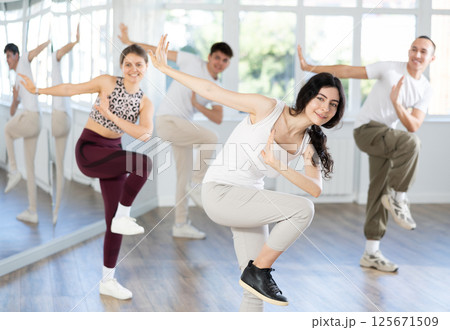 Group of young people dancing hip hop 125671509