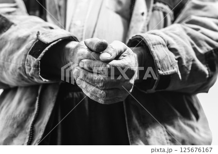 The hands are dirty and muddy, and they are open to show the dirt.  125676167