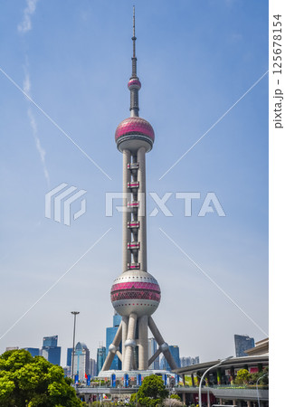 Shanghai, China - 1 April 2025: A stunning view of the Oriental Pearl Tower, a futuristic gem in Shanghai's ever-evolving skyline Shanghai, China - 1 April 2025: A stunning view of the Oriental Pearl Tower, a futuristic gem in Shanghai's ever-evolving skyline 125678154