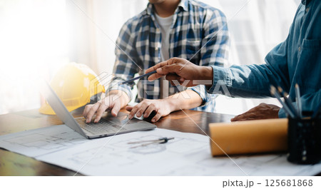 Engineer Teamwork Meeting, Drawing working on blueprint meeting for project working with partner on model building at company office. industry professional team 125681868