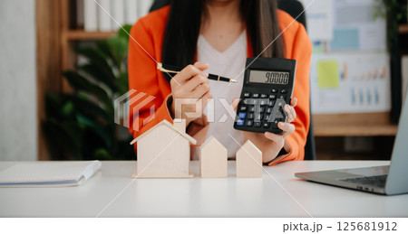 Customers who choose to buy a condominium room and a bank approve a loan for their purchase. Condominium and house loan interest rate from bank concept 125681912