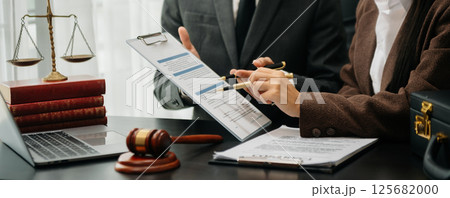 Business and Male lawyer or judge consult having team meeting with client, Law and Legal services concept.Customer service good cooperation in office 125682000