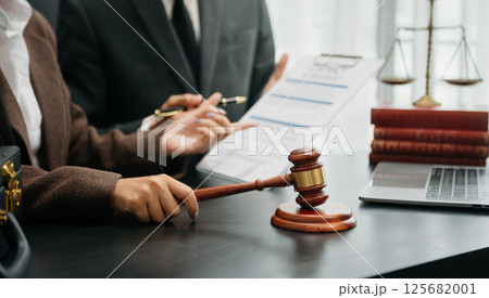 Business and Male lawyer or judge consult having team meeting with client, Law and Legal services concept.Customer service good cooperation in office Business and Male lawyer or judge consult having team meeting with client, Law and Legal services concept.Customer service good cooperation in office 125682001