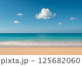 砂浜と青い海と青い空そして白い雲 125682060