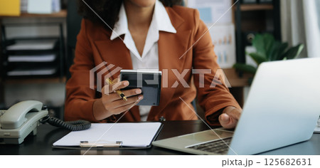 Business accountant or financial expert analyze business report graph and finance chart. banking business and stock market research. Business accountant or financial expert analyze business report graph and finance chart. banking business and stock market research. 125682631