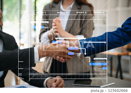 business people shaking hands during a meeting in office business people shaking hands during a meeting in office 125682666