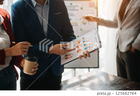 Business team meeting. professional investor working with smart phone, laptop and tablet computer Business team meeting. professional investor working with smart phone, laptop and tablet computer 125682764