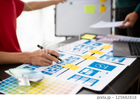 Creative digital development agency. UX graphic designer planning application process development prototype wireframe for web smart phone. 125682818