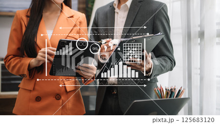 Data Management System with Business Analytics concept. business team hands working with provide information for Key Performance Indicators and marketing analysis onn virtual computer 125683120