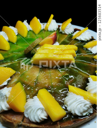 detail of mango cake detail of mango cake 125683514
