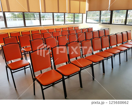 Chairs in an empty business meeting office room indoor 125688662