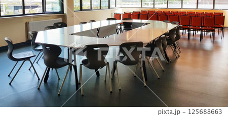 Empty meeting room. Business conference office with chair and table. Modern interior, nobody 125688663