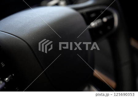 Close-up of black leather seat of modern car 125690353