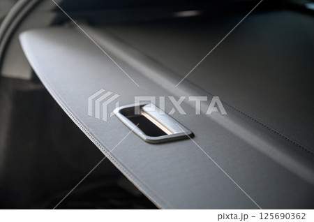 Large black empty car trunk. Open car trunk close up Large black empty car trunk. Open car trunk close up 125690362