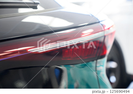 Close up of rear taillight on a vehicle 125690494
