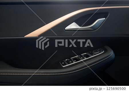 Car door with door handle and window control and adjustment button Car door with door handle and window control and adjustment button 125690500
