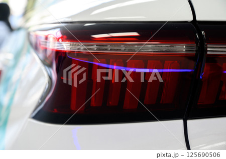 Close up of rear taillight on a vehicle Close up of rear taillight on a vehicle 125690506