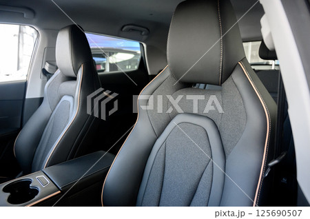 Interior of a modern car with black leather seats Interior of a modern car with black leather seats 125690507