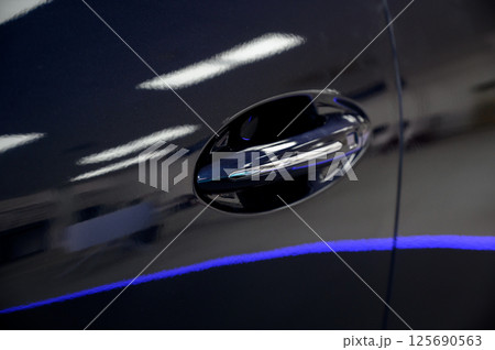 Modern door handle new car. Smart retractable door handles 125690563