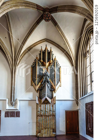 Passau, Germany - Apr 16, 2025: St. Stephans cathedral in Passau, Germany is an old white church with green metal domes 125692019