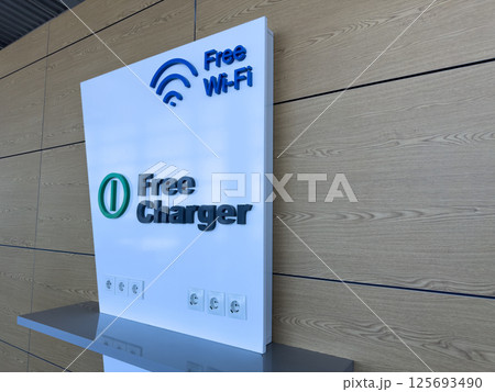 Tech-friendly corner with free Wi Fi and charging options, supporting digital connectivity and convenience for users in high traffic environments like terminals or cafes Tech-friendly corner with free Wi Fi and charging options, supporting digital connectivity and convenience for users in high traffic environments like terminals or cafes 125693490