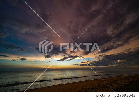 Aerial view sunset sky,Nature beautiful light sunset or sunrise over sea surface,Colorful sunset sky with clouds and waves in the ocean,Wide angle sea background 125693943